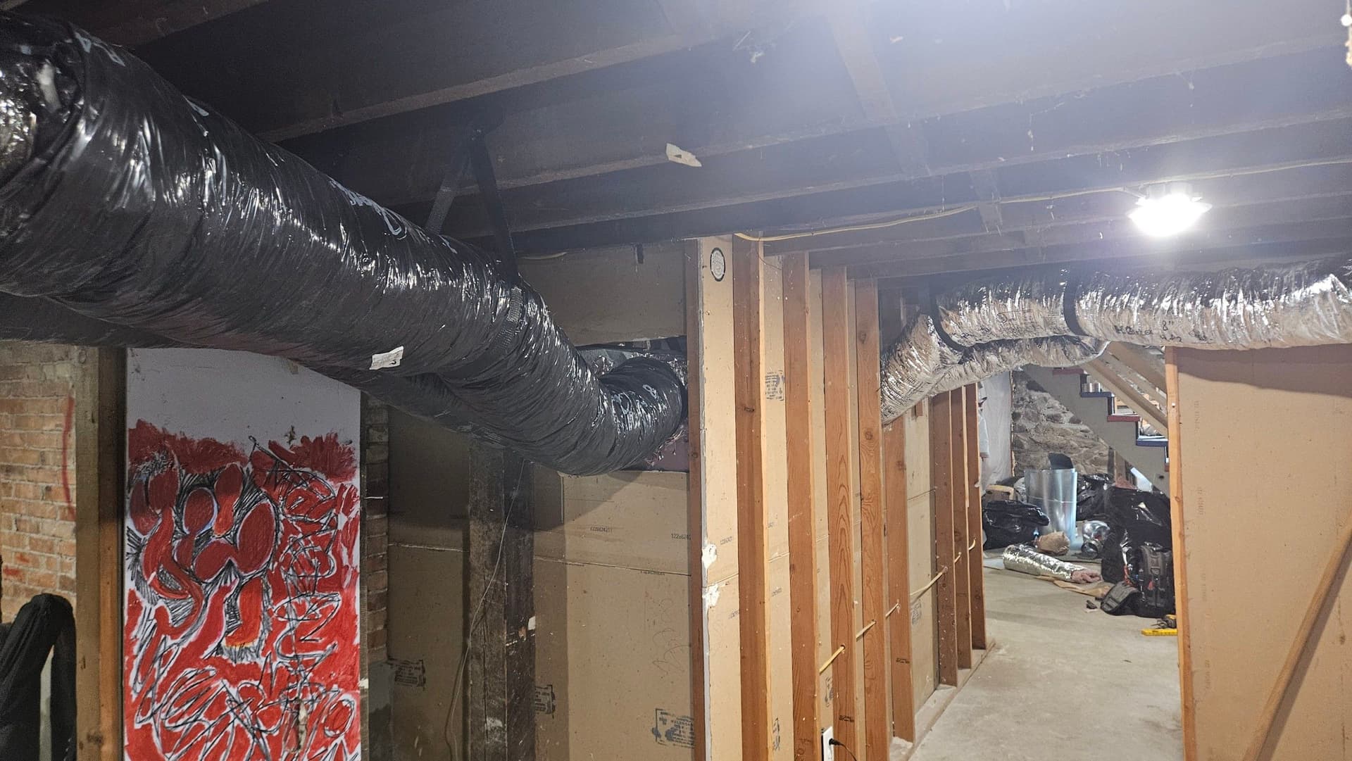 Gallery photos for Asbestos Duct Removal and New Flex Duct Installation in a Basement: Image #4